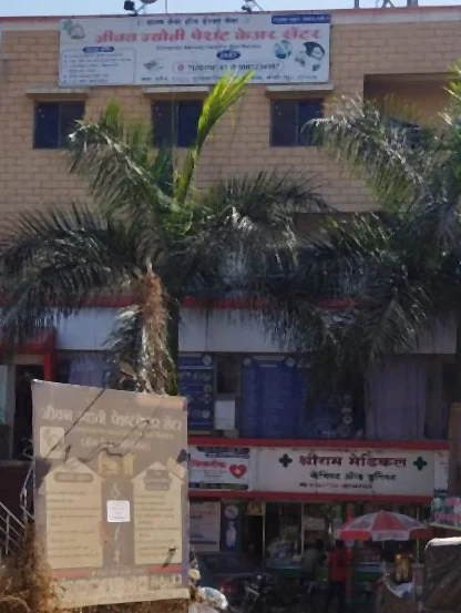 The building exterior with Jeevan Jyoti signage in Manjari