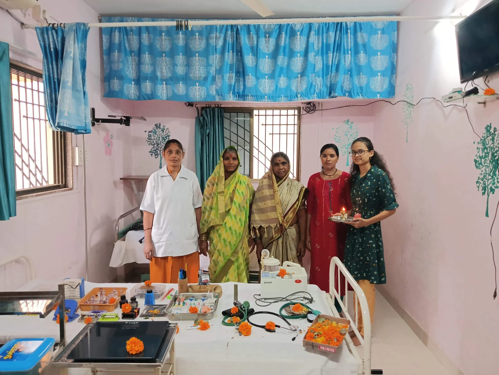 People gathered inside a care room at Jeevan Jyoti