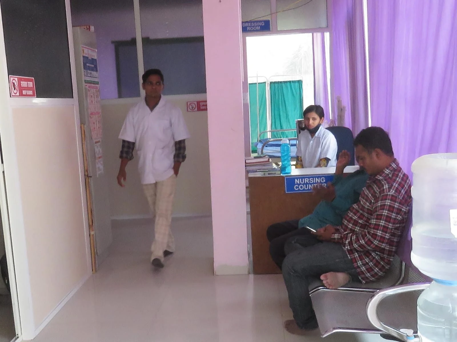 A passage beside the nursing counter and patient rooms