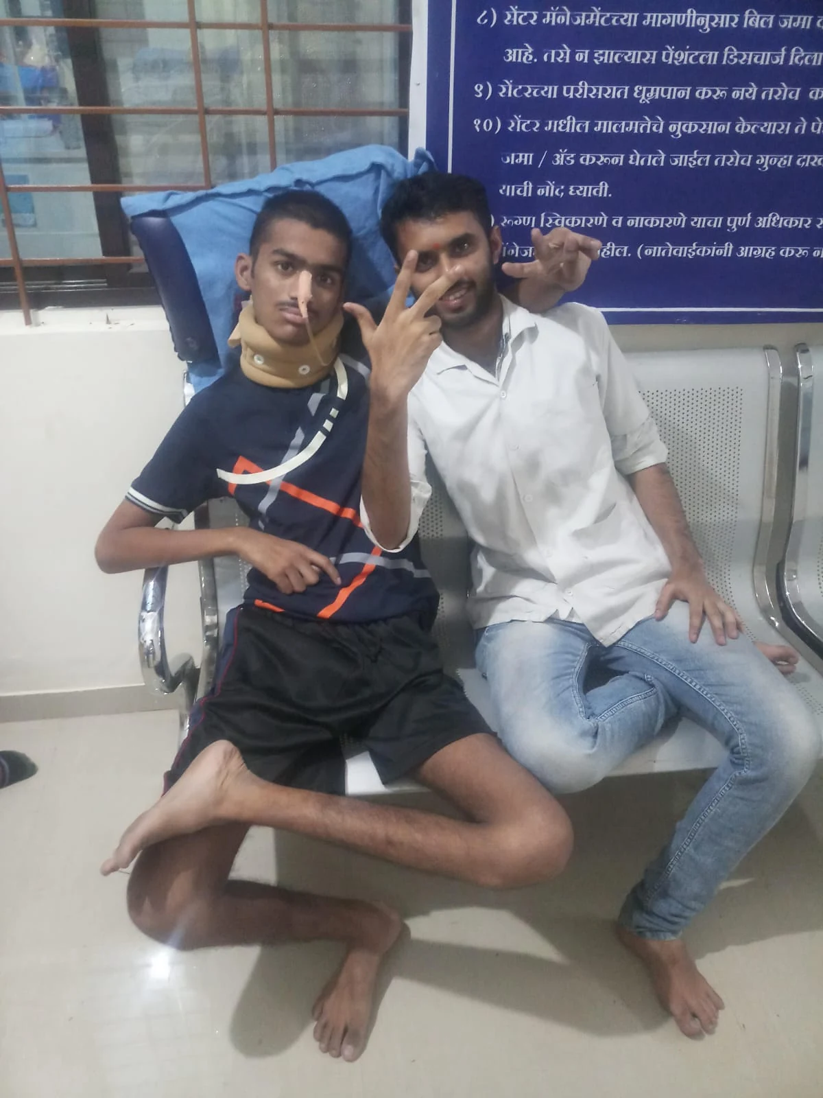 Two people sitting together at Jeevan Jyoti