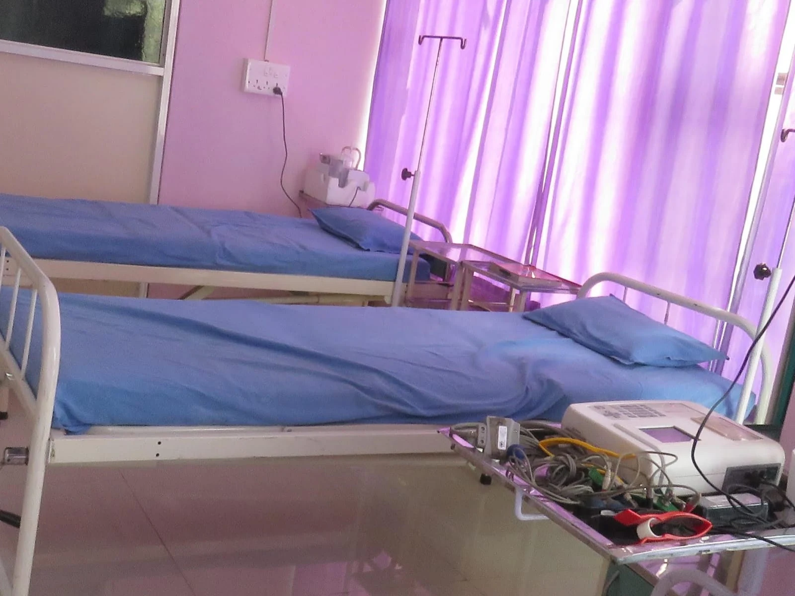 Care beds and equipment in a patient room